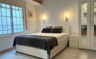 Cama o camas de una habitación en Lets Holidays Comfortable Apartment Near Beach