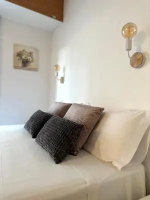 Cama o camas de una habitación en Lets Holidays Comfortable Apartment Near Beach