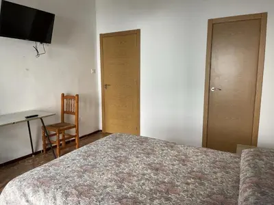 Cama o camas de una habitación en Fonda Joan
