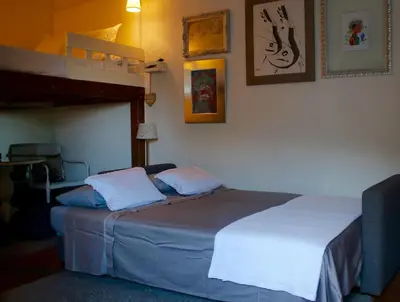Cama o camas de una habitación en Casa Rosa Garden House