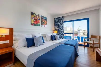 Cama o camas de una habitación en Hotel Tahití Playa 4S