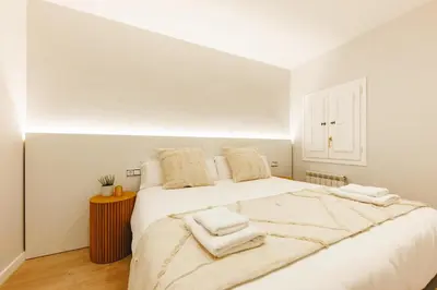 Cama o camas de una habitación en Bravissimo Apartaments Mora 4