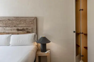 Cama o camas de una habitación en Flateli Pou Rodó 3