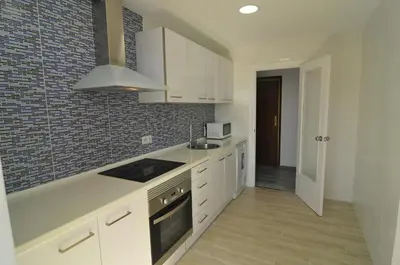 Una cocina o zona de cocina en HomeHolidaysRentals Solmar