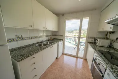 Una cocina o zona de cocina en HomeHolidaysRentals Santa Susanna VIII