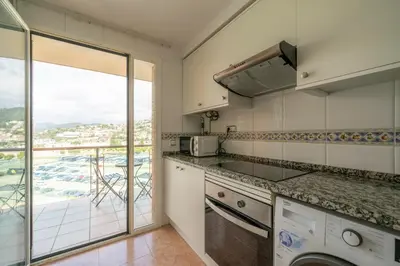 Una cocina o zona de cocina en HomeHolidaysRentals Santa Susanna VIII