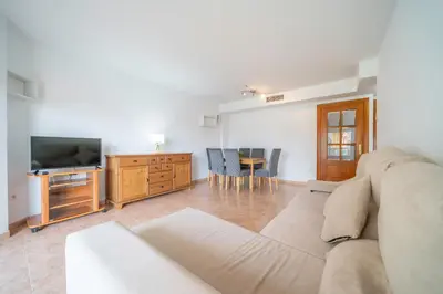 Una televisión o centro de entretenimiento en HomeHolidaysRentals Santa Susanna VIII