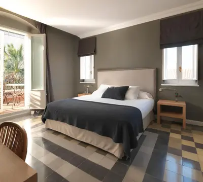 Cama o camas de una habitación en Casa Vincke Hotel