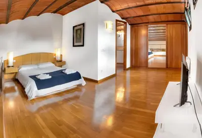 Cama o camas de una habitación en Galligants Apartment