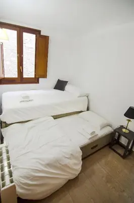 Cama o camas de una habitación en Galligants Apartment