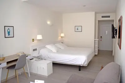 Cama o camas de una habitación en Hotel Llafranch