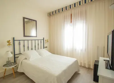 Cama o camas de una habitación en Hotel Llafranch