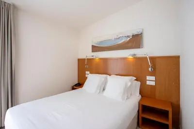 Cama o camas de una habitación en Hotel Llafranch