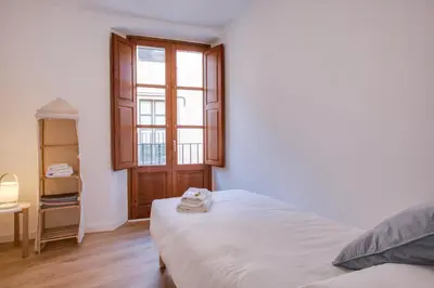 Cama o camas de una habitación en Flateli Cort Reial