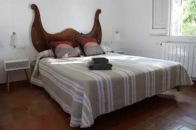 Cama o camas de una habitación en ÀNCORA VELLA