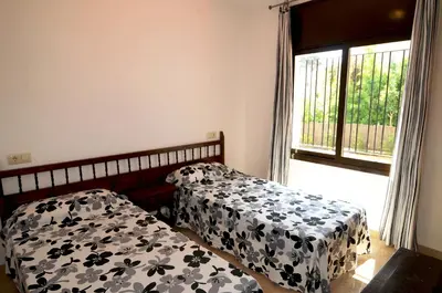 Cama o camas de una habitación en Apartamentos AR Caribe