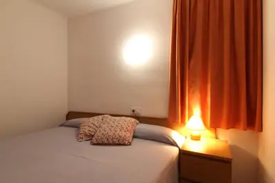 Cama o camas de una habitación en Apartaments El Sorrall