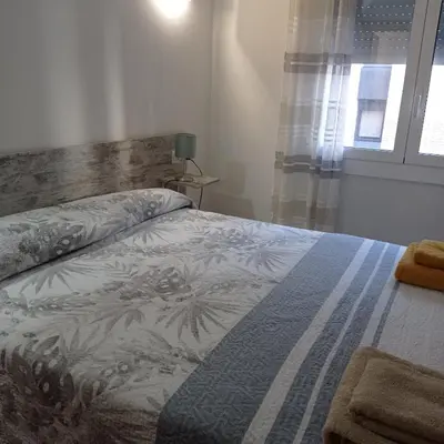 Cama o camas de una habitación en Piso con Encanto