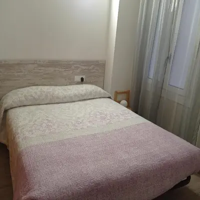 Cama o camas de una habitación en Piso con Encanto