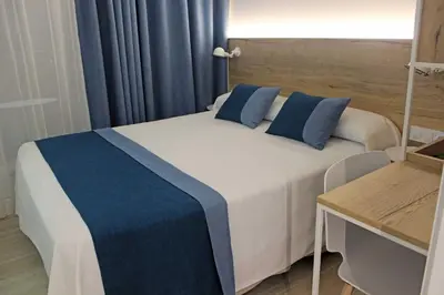 Cama o camas de una habitación en Rocatel