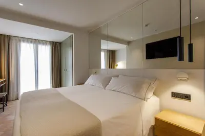 Cama o camas de una habitación en Hostal Spa Olga