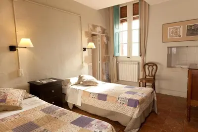 Cama o camas de una habitación en Turisme Rural Mas Masaller
