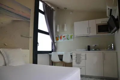 Una cocina o zona de cocina en Apartamento playa Costa Barcelona