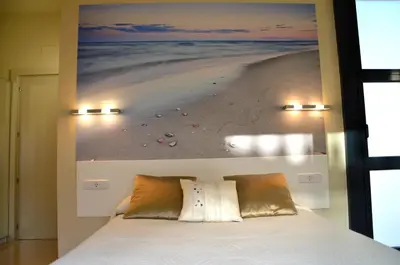 Cama o camas de una habitación en Apartamento playa Costa Barcelona