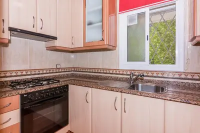 Una cocina o zona de cocina en HomeHolidaysRentals Vall III