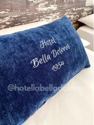 Cama o camas de una habitación en Hotel Bella Dolores