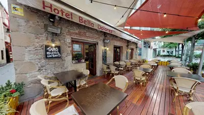Un restaurante o sitio para comer en Hotel Bella Dolores