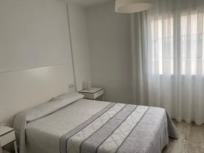Cama o camas de una habitación en VicAm Atico Duplex