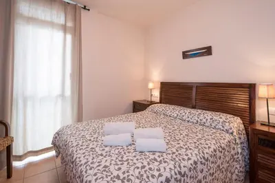 Cama o camas de una habitación en Apartamentos Llafranc Mar