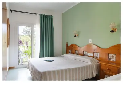 Cama o camas de una habitación en Hotel Ninays