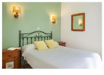 Cama o camas de una habitación en Hotel Ninays
