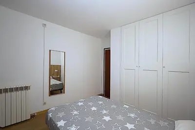Cama o camas de una habitación en Apartamentos Zodiac