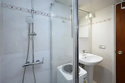 Un baño de Apartamentos Zodiac