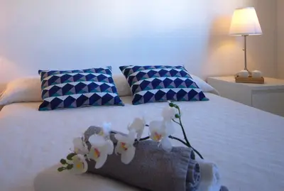 Cama o camas de una habitación en Lets Holidays QUIET APARTMENT 5 minutes TO THE BEACH