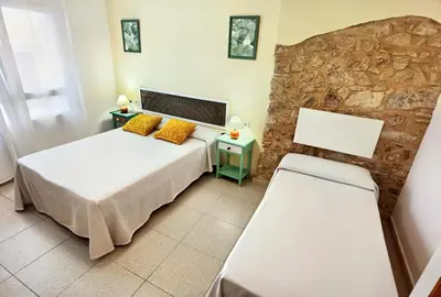 Cama o camas de una habitación en Hostal Noray