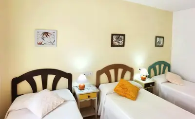 Cama o camas de una habitación en Hostal Noray