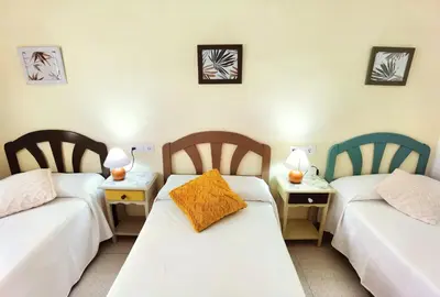 Cama o camas de una habitación en Hostal Noray