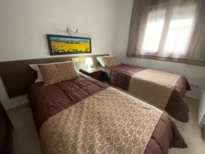 Cama o camas de una habitación en Apartamentos AR Isern