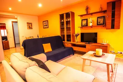 Una televisión o centro de entretenimiento en Apartaments Yaco