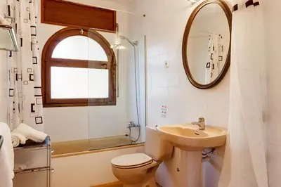 Un baño de Angela