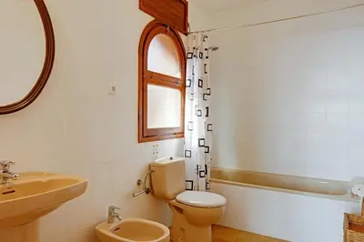 Un baño de Angela