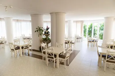 Un restaurante o sitio para comer en Hotel Haromar