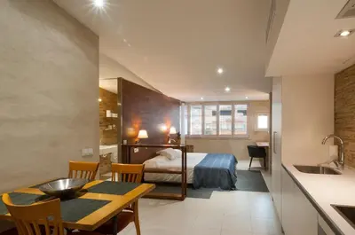 Cama o camas de una habitación en Onyar apartments Rambla de la llibertat 27