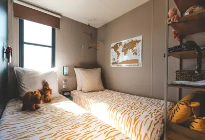 Cama o camas de una habitación en Camping Resort-Bungalow Park Mas Patoxas