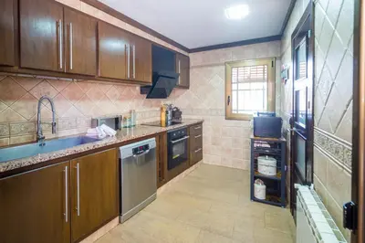 Una cocina o zona de cocina en Villa Del Sol