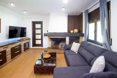 Una televisión o centro de entretenimiento en Villa Del Sol